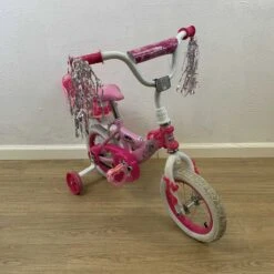Huffy Disney Princess Girls' 12" Bike With Doll Carrier -Tiny Steps House 55aa1ace08e3cf330804e3d167216d6a