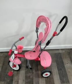 Radio Flyer Ride And Stand Stroll ‘n Trike, Pink -Tiny Steps House 9c5e6e239d1e7386731fbd62a7c5857b