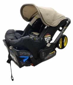 Doona Pottery Barn Kids Exclusive Edition Infant Car Seat Stroller, 2023, Warm Stone -Tiny Steps House a62e99db 71b8 4f7d 82d2 909301b3387e